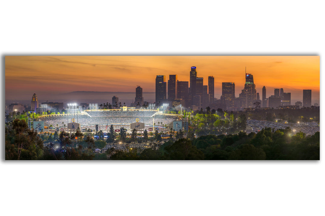 Dodger Stadium illuminated during Game 1 of the 2024 World Series with the Los Angeles skyline