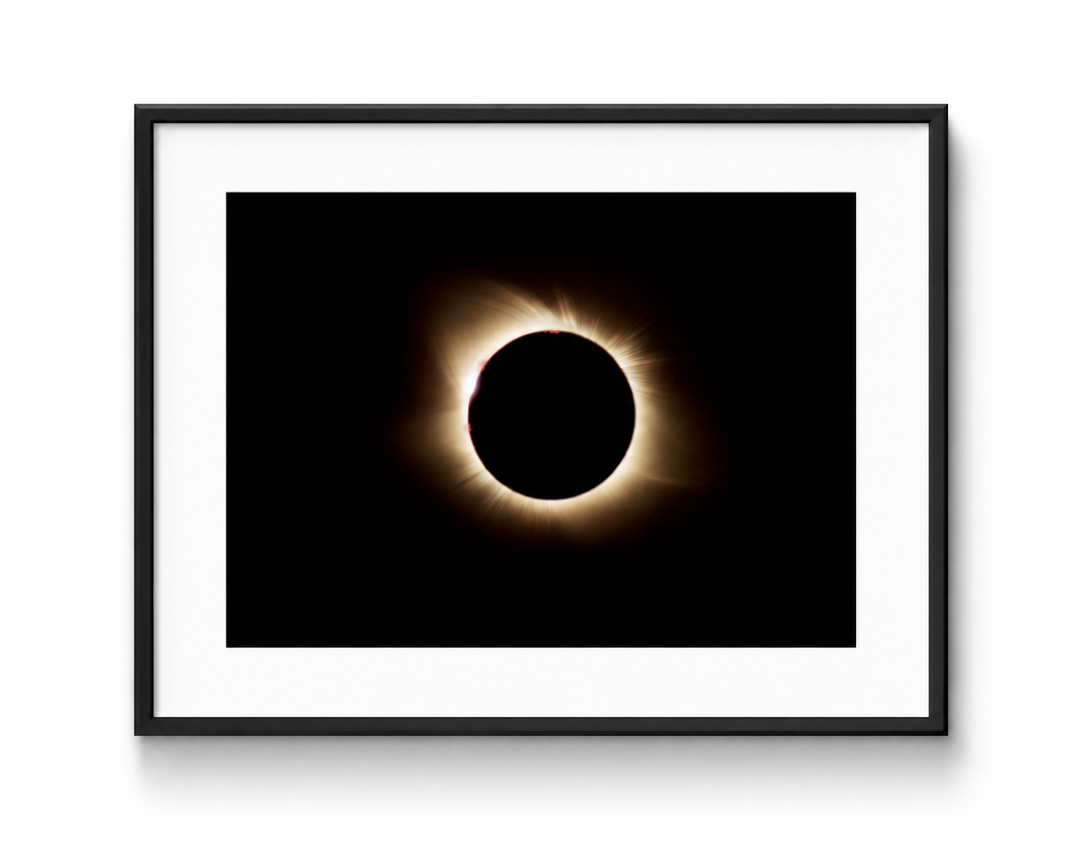 2017 Solar Eclipse Over Grand Teton fine art print in a black frame with white mat