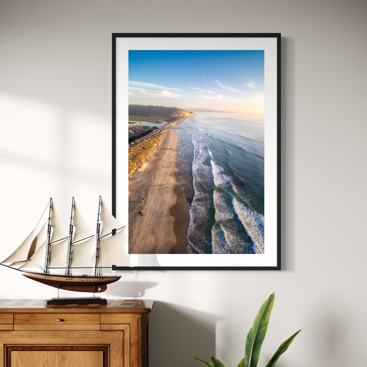 Del Mar California Aerial Beach displayed in a styled room interior