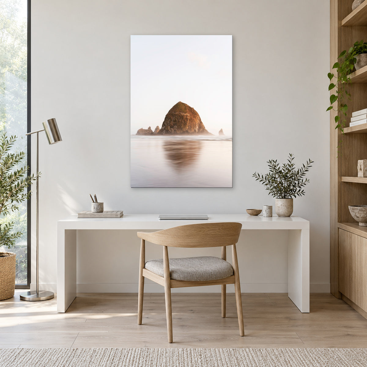 Haystack Rock print from Cannon Beach, Oregon displayed in a light home office, without a frame; room mockup.