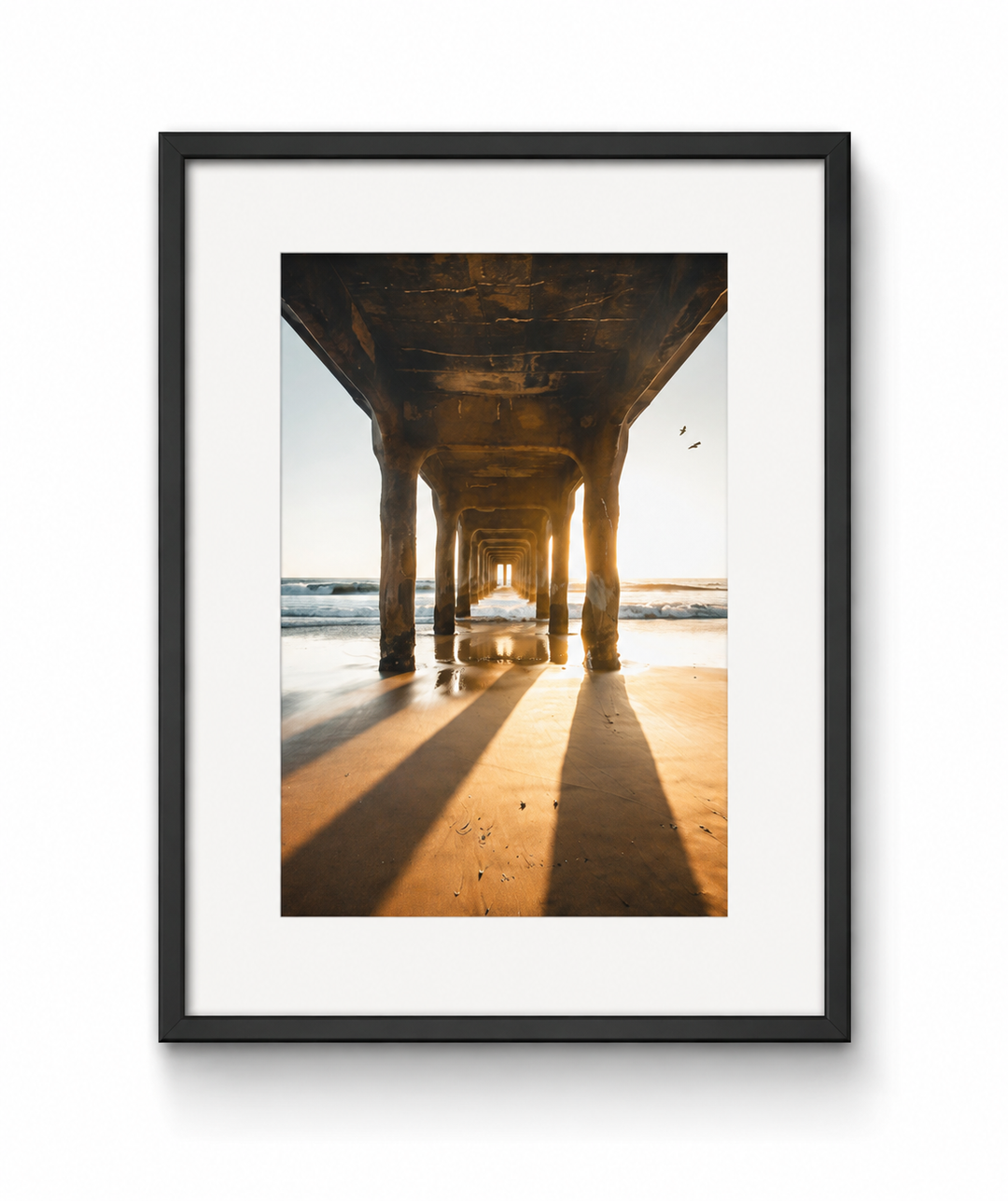 Manhattan Beach Pier Sunset Pillars Fine Art Print in a black frame with white mat